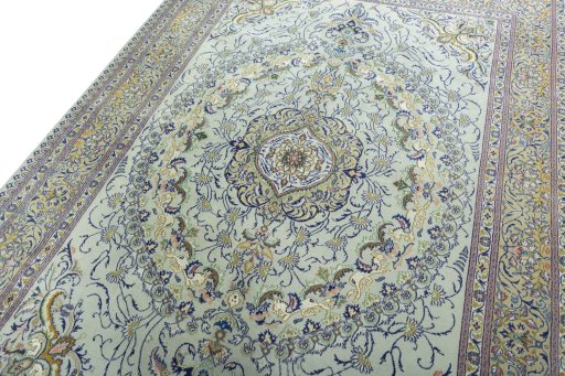 Backside of handmade 2000s Moud rug showing knot structure and weave density