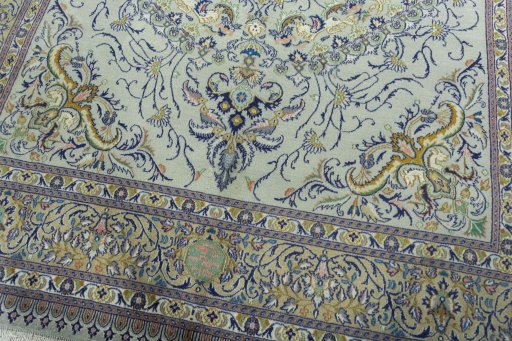 Close-up detail of 2000s Moud rug from Iran / Persia showing Wool weave