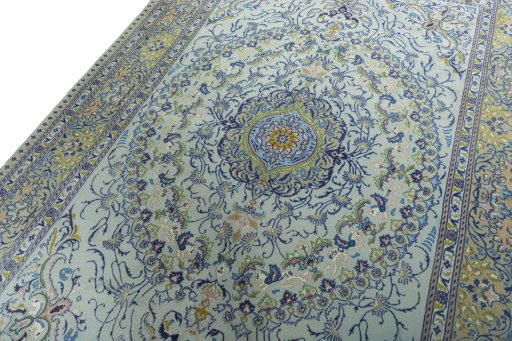 Backside of handmade 2000s Moud rug showing knot structure and weave density