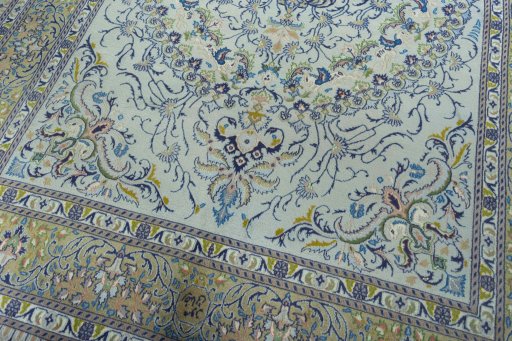 Close-up detail of 2000s Moud rug from Iran / Persia showing Wool weave