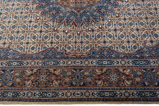 Corner detail of 2000s Moud rug showing border pattern and Wool pile