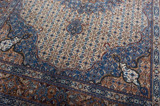 Close-up detail of 2000s Moud rug from Iran / Persia showing Wool weave
