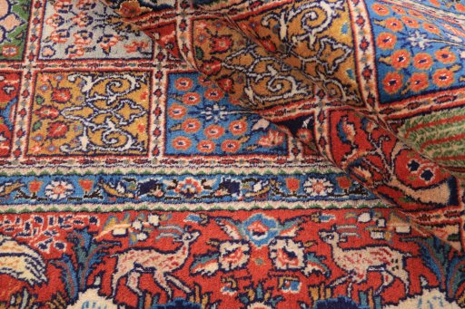 Corner detail of 2000s Moud rug showing border pattern and Wool pile