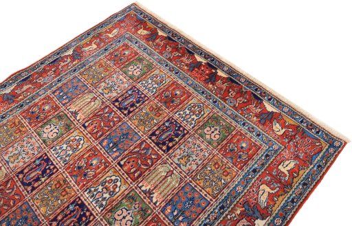 Surface texture of 2000s Moud rug with natural Wool and intricate pattern