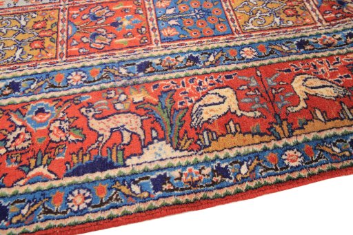 Backside of handmade 2000s Moud rug showing knot structure and weave density