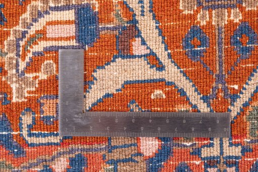 Surface texture of 1970s Moud rug with natural Wool and intricate pattern