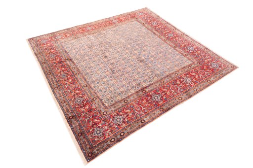 Corner detail of 1970s Moud rug showing border pattern and Wool pile