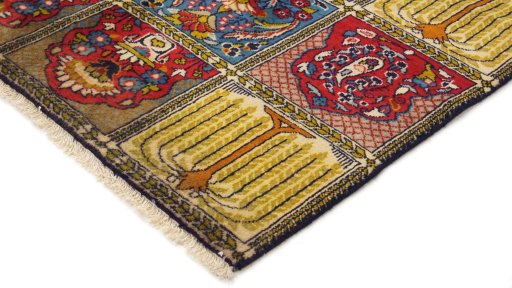 Backside of handmade 1990s Moud rug showing knot structure and weave density