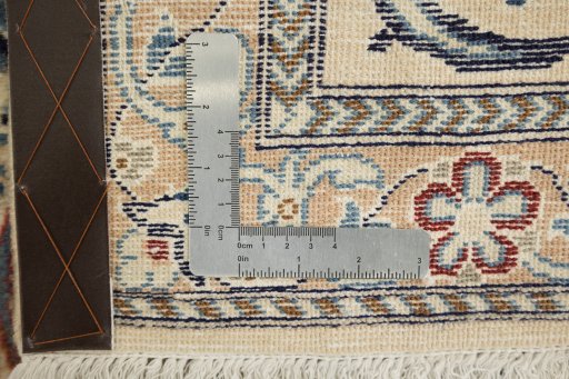 Corner detail of New Nain rug showing border pattern and Wool pile