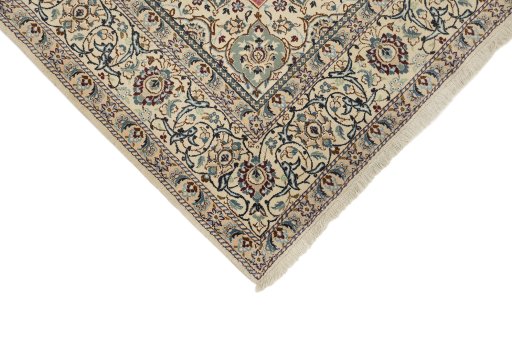 Backside of handmade New Nain rug showing knot structure and weave density