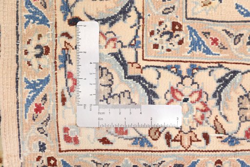 Corner detail of New Nain rug showing border pattern and Wool pile
