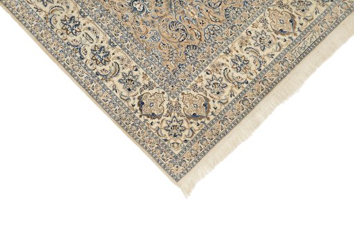 Backside of handmade 1960s Nain rug showing knot structure and weave density