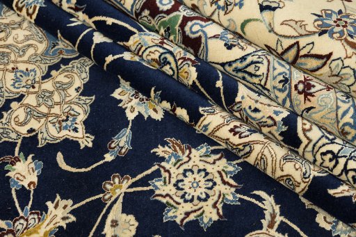 Corner detail of 1980s Nain rug showing border pattern and Wool pile