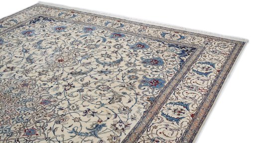 Surface texture of 1980s Nain rug with natural Wool and intricate pattern