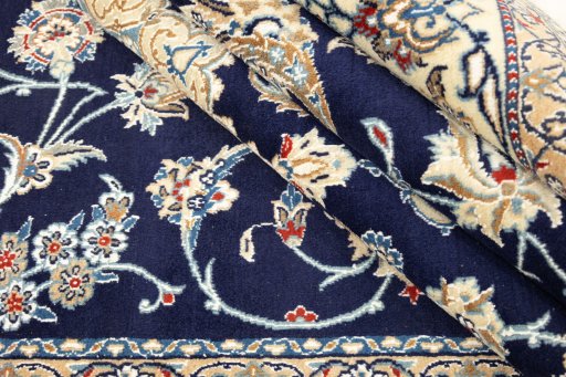 Close-up detail of 1990s Nain rug from Iran / Persia showing Wool weave