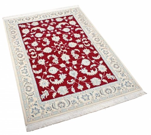 Corner detail of New Nain rug showing border pattern and Cork pile