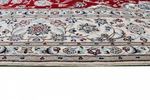 Corner detail of New Nain rug showing border pattern and Cork pile