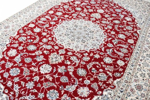 Backside of handmade New Nain rug showing knot structure and weave density