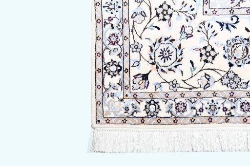 Corner detail of New Nain rug showing border pattern and Cork pile