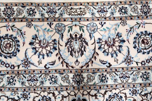 Central medallion detail of New Nain rug from Iran / Persia