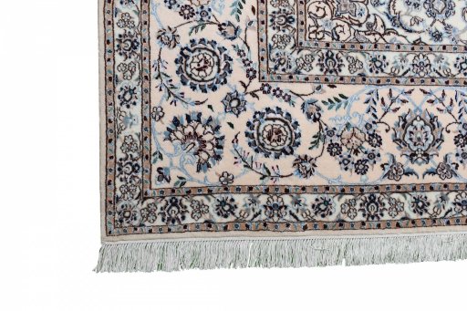 Corner detail of New Nain rug showing border pattern and Wool pile
