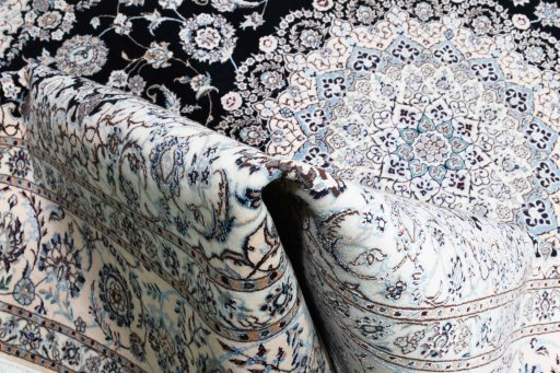Close-up detail of New Nain rug from Iran / Persia showing Wool weave