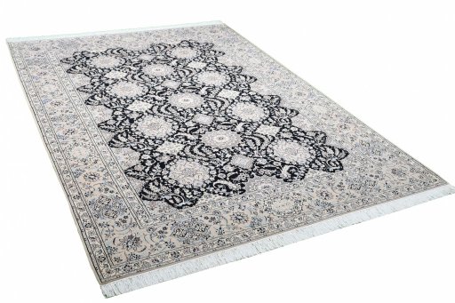 Corner detail of New Nain rug showing border pattern and Cork pile