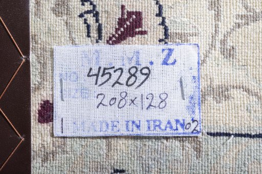 Backside of handmade 2000s Nain rug showing knot structure and weave density
