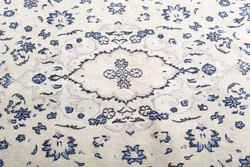 Central medallion detail of 2000s Nain rug from Iran / Persia