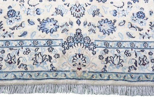 Close-up detail of 2000s Nain rug from Iran / Persia showing Wool weave