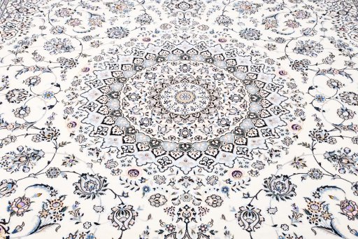 Corner detail of New Nain rug showing border pattern and Wool pile