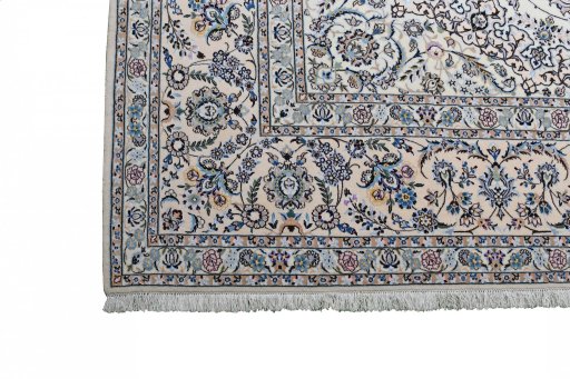 Corner detail of New Nain rug showing border pattern and Wool pile