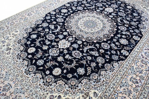 Corner detail of New Nain rug showing border pattern and Cork pile