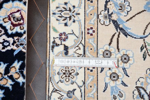 Corner detail of New Nain rug showing border pattern and Cork pile