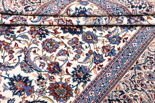 Corner detail of 1930s Nain rug showing border pattern and Wool pile