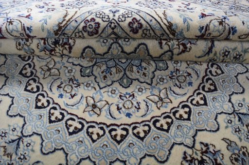 Close-up detail of New Nain rug from Iran / Persia showing Wool weave