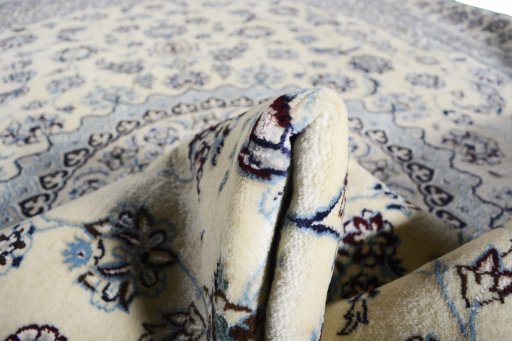 Surface texture of New Nain rug with natural Wool and intricate pattern