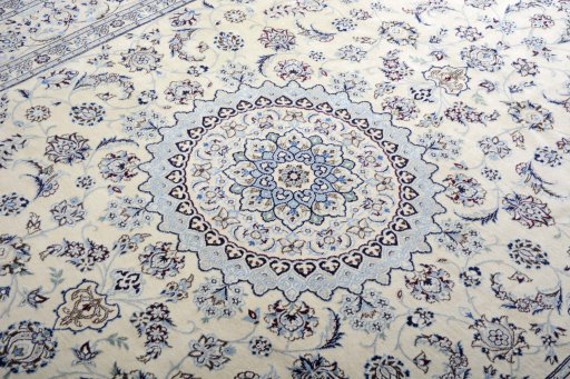 Backside of handmade New Nain rug showing knot structure and weave density