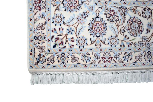 Corner detail of New Nain rug showing border pattern and Cork pile