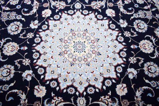 Central medallion detail of New Nain rug from Iran / Persia