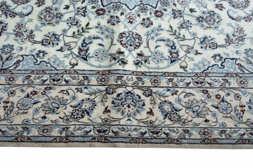 Corner detail of New Nain rug showing border pattern and Cork pile