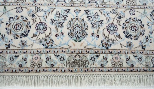Full view of New Nain rug from Iran / Persia, 318 × 210 cm in Beige tones