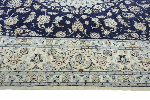Corner detail of New Nain rug showing border pattern and Cork pile