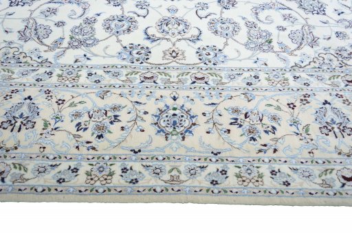 Corner detail of New Nain rug showing border pattern and Cork pile