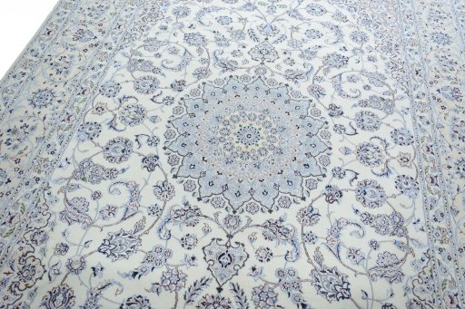 Backside of handmade New Nain rug showing knot structure and weave density