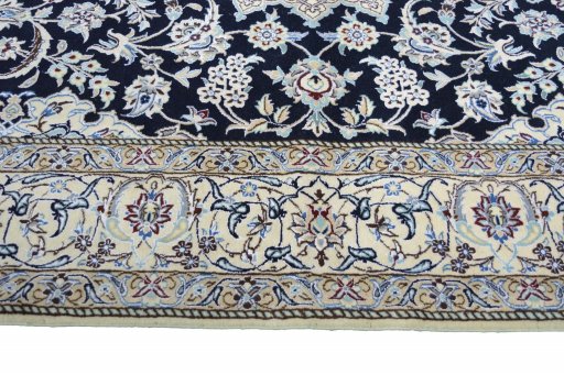 Corner detail of New Nain rug showing border pattern and Cork pile