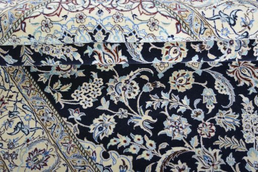 Close-up detail of New Nain rug from Iran / Persia showing Cork weave