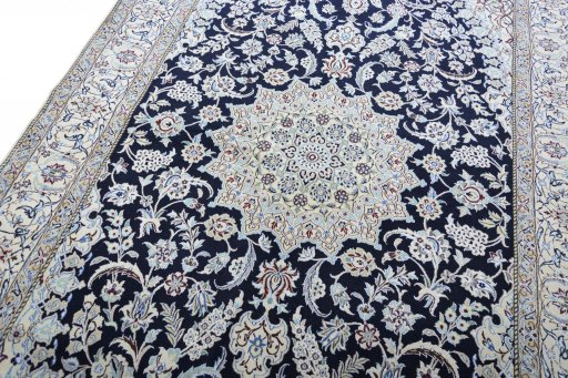Backside of handmade New Nain rug showing knot structure and weave density