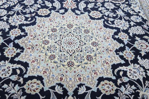 Central medallion detail of New Nain rug from Iran / Persia