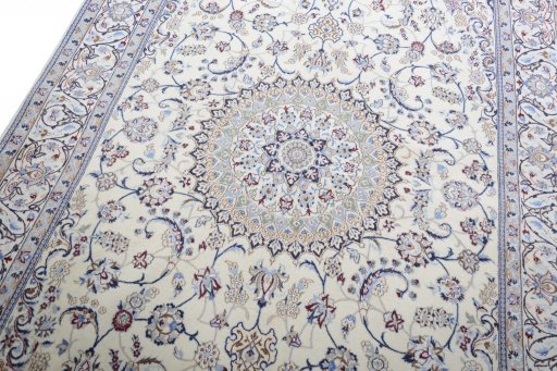 Backside of handmade New Nain rug showing knot structure and weave density